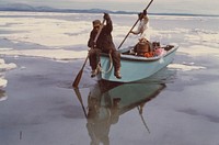 Eskimo seal hunters along ice floes of Kotzebue Sound. Original public domain image from Flickr