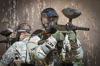 U.S. Army Spc. Julian Ditona, right, a multi-channel transmission systems operator assigned to the 98th Expeditionary Signal Battalion, keeps an eye out for simulated enemy activity during an urban operations scenario event at Fort Huachuca, Arizona, March 29, 2017.