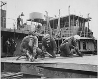 Chippers in a Shipyard (Shipbuilding. Three Women Working), 1942. Original public domain image from Flickr