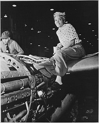Riveter at Lockheed Aircraft Corporation, Burbank, California, 1940-1945. Original public domain image from Flickr