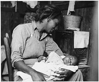 Migrant Cotton Picker and Her Baby near Buckeye, Maricopa County, Arizona. Original public domain image from Flickr