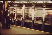 Man Backs Away from Roar of Subway Train, 05/1973. Original public domain image from Flickr