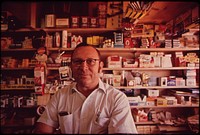Morris Fisher, Owner of the Local Grocery and Drugstore, 11/1972. Original public domain image from Flickr