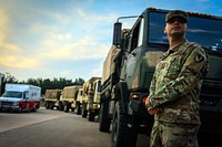 A U.S. Soldier with the 20th Engineer Battalion, 36th Engineer Brigade, waits to load supplies that will be distributed the towns effected Hurricane Harvey in a in a reconnaissance mission to asses the damage and combat the affects of the hurricane at an American Red Cross Distribution Center in Sugar Land, Texas Sep. 3, 2017.