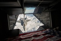 United States Air Force F-22 Raptor receives fuel from a KC-10 Extender over Syria, during a mission in support of Operation Inherent Resolve, Nov. 22, 2017.