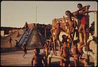 Youngsters on the July 4th Holiday at the Kosciusko Swimming Pool in Brooklyn's Bedford-Stuyvesant District, New York City. Inner City Residents Enjoy Using This Intelligently Located Pool. The Inner City Today Is an Absolute Contradiction to the Main Stream America of Gas Stations, Expressways, Shopping Centers and Tract Homes.