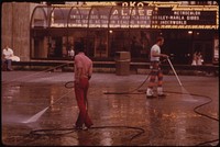 Fountain Square in Downtown Cincinnati Is a Public Square That Works for the City and Its People in a Myriad of Ways: Chemical Cleaning of Granite Paving Block Surface 06/1973. Photographer: Hubbard, Tom. Original public domain image from Flickr