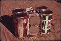Basic Building Block of Experimental Housing Being Built of Empty Steel Beer and Soft Drink Cans near Taos, New Mexico. a Total Of Eight Cans Weighing 14 Ounces Are Wired Together And Placed In Mortar In The Outside Walls At a Cost Of 15 Cents Per Unit. Original public domain image from Flickr