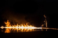 A U.S. Marine with Aircraft Rescue and Firefighting (ARFF) ignites fuel before the start of a controlled burn exercise at Marine Corps Air Station, Cherry Point, N.C., Dec. 12, 2017.