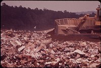 Covering Garbage with One Foot of Earth at Westchester County's Croton Landfill Operation 08/1973. Photographer: Blanche, Wil. Original public domain image from Flickr