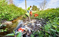 Spring Clean-Up 2018Volunteers from Brody School of Medicine collect litter along MacGregor Downs Rd, Greenville, April 14, 2018. Original public domain image from Flickr