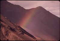 A Rainbow Seems Rooted in a Rock Wall That Forms the North Side of the Atigun Gorge, 5 Miles East of the Point Where the Pipeline Will Cross the Atigun River. Original public domain image from Flickr