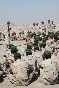 Iraqi army Lt. Col. Dhafer Hapeb Abud, the commander of Commandos Battalion, 10th Iraqi Army Division, briefs his soldiers on the first day of a war fighter exercise at Camp Ur in Dhi Qar, Iraq, Oct. 3, 2009.