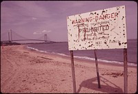 Warning of Polluted Water at Staten Island Beach Verrazano-Narrows Bridge in Background 06/1973. Photographer: Tress, Arthur. Original public domain image from Flickr