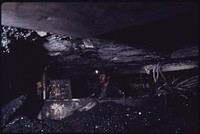 Harley Owens in Position as a Machine Operator on the End of the Long Wall Where the Coal Is Placed on a Conveyor Belt 04/1974. Photographer: Corn, Jack. Original public domain image from Flickr