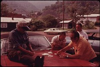 Picket Line at the Brookside Mine Company in Harlan County Kentucky, near Middlesboro in the Southeastern Part of the State the Strikers Are Playing Cards on the Hood of a Car 06/1974. Photographer: Corn, Jack. Original public domain image from Flickr