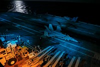 A U.S. Navy F/A-18F Super Hornet assigned to the Gladiators of Strike Fighter Squadron (VFA) 106 taxis across the flight deck of the Nimitz-class carrier USS Abraham Lincoln (CVN 72) Jan 31, 2018, in the Atlantic Ocean.