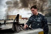 U.S. Navy Aviation Ordnanceman 3rd Class Austin Yoast, from San Antonio, starts a test on a MH-60S Sea Hawk helicopter assigned to the Dusty Dogs of Helicopter Sea Combat Squadron (HSC) 7 at Naval Station Norfolk, Virginia, April 10, 2018.