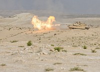 A U.S. Army M1 Abrams tank from 2nd Brigade Combat Team, 1st Armored Division, Fort Bliss, Texas fires a 120mm round during a live fire exercise at Iron Union 18-6 in the United Arab Emirates, Jan. 23, 2018.