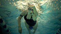 U.S. Marine Corps Cpl. Jessia Ocasil, of Wounded Warrior Battalion East and a Paterson, N.J., native, practices her freestyle stroke ahead of the 2018 Marine Corps Trials swim competition in the Wallace Creek pool at Camp Lejeune, N.C., March 19, 2018.