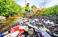 Spring Clean-Up, volunteers from Brody School of Medicine collect litter along MacGregor Downs Rd, April 14, 2018. Original public domain image from Flickr