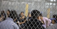 U.S. Border Patrol agents conduct intake of illegal border crossers at the Central Processing Center in McAllen, Texas, Sunday, June 17, 2018.