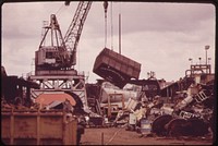 Old Railroad Box Cars, Auto Bodies and Other Junk for Scrap Metal Pile Up at the American Ship Dismantling Division on the Willamette River 04/1973. Photographer: Falconer, David. Original public domain image from Flickr