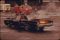 Actual Demonstration by the Fire Department Training Station Showing What Would Happen after a Rear End Accident If a Five Gallon Can of Gasoline Was Carried in the Trunk of an Auto. Photographer: Falconer, David. Original public domain image from Flickr