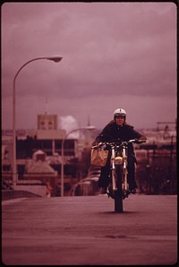 Motorcycles Came Out of Summer Vacation Retirement During the Fuel Crisis in the Pacific Northwest During the Fall of 1973. This Person Is Riding in Portland 11/1973. Photographer: Falconer, David. Original public domain image from Flickr