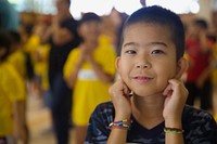 Okinawan children learn the English word “ears” during a community relations event at Kin District Daycare, Okinawa, Japan, Aug. 14, 2018.