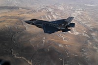 A U.S. Navy F-35C Lightning II, attached to the 'Argonauts' of Strike Fighter Squadron (VFA) 147, stationed at Naval Air Station (NAS) Lemoore, California, fly in formation for a photo exercise over California Nov. 16, 2018.