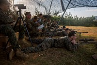 U.S. Marines with the 3rd Reconnaissance Battalion, 3rd Marine Division, receive instructions on which targets they willengage during a live-fire range at Camp Hansen, Okinawa, Japan, Nov. 27, 2018.
