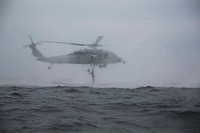 U.S. Marines with the 31st Marine Expeditionary Unit’s Amphibious Reconnaissance Platoon exit a U.S. Navy MH-60S Seahawk helicopter during Helocast and Special Patrol Insertion and Extraction training, underway in the East China Sea, Oct. 14, 2018.