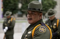 The U.S. Border Patrol drill team performs after the annual Valor Memorial & Wreath Laying Ceremony held in Woodrow Wilson Plaza outside the Ronald Reagan Building in Washington, D.C., May 16, 2019.