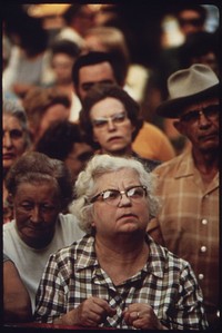 Audience at an Auction of Household Goods in a Residential Area. They Usually Are Held in the Summer Months to Sell Household Possessions of Retired People Who Are Moving to Apartments, Or Who Have Died. New Ulm Is a County Seat Trading Center of 13,000 in a Farming Area of South Central Minnesota.