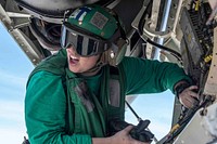 190805-N-PL543-1100 SOUTH CHINA SEA (August 5, 2019) Aviation Electronics Technician Airman Kimberly Caldwell, from Abilene, Texas, installs a radar beacon transmitter into an F/A-18E Super Hornet assigned to Strike Fighter Squadron (VFA) 102 on the flight deck of the Navy’s forward-deployed aircraft carrier USS Ronald Reagan (CVN 76).