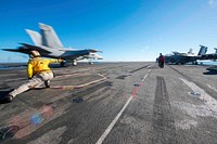 U.S. Navy Lt. Kristin Hope, from Ogden, Utah, signals for the launch of an F/A-18E Super Hornet from Strike Fighter Squadron (VFA) 115 on the flight deck aboard the Navy’s forward-deployed aircraft carrier USS Ronald Reagan (CVN 76) during Talisman Sabre 2019 in the Coral Sea, July 17, 2019.