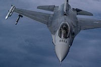 A U.S. Air Force F-16C Fighting Falcon with the 177th Fighter Wing flies behind a 108th Wing KC-135R Stratotanker during aerial refueling over the Atlantic Ocean on Aug. 18, 2021.