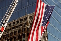 A large American Flag hangs from ladder trucks outside of St. Patrick’s Cathedral shortly before the start of the annual Blue Mass held in honor of fallen police in Washington, D.C., September 29, 2001.