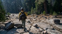El Dorado Hot Shot, Ben Strahan, hikes into El Dorado National Forest to continue mop up of the Caldor Fire, California.