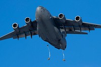 Air Force and Army conduct joint airborne operations at JBERU.S. Army paratroopers assigned to the 2nd Battalion, 377th Parachute Field Artillery Regiment, 2nd Infantry Brigade Combat Team (Airborne), 11th Airborne Division, “Arctic Angels,” jump from a U.S. Air Force C-17 Globemaster III during joint airborne training over Malemute Drop Zone, Joint Base Elmendorf-Richardson, Alaska, Nov. 9, 2022. The aircrew and aircraft were assigned to the 62nd Airlift Wing out of Joint Base Lewis-McChord, Wash. The 2/11 IBCT (A) is the only airborne infantry brigade combat team in the Arctic and Pacific theaters, providing the combatant commander with the unique capability to project an expeditionary force by air. (U.S. Air Force photo by Alejandro Peña)