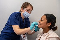 CP22 - WPS Provides Medical Care at Juan Fe221115-N-LP924-1169 CARTAGENA, Colombia (Nov. 15, 2022) Hospitalman Brianna Connaghan, from Kings Bay, Georgia, assigned to the hospital ship USNS Comfort (T-AH 20), cleans teeth during a Women’s, Peace and Security (WPS) event with free medical care as part of Continuing Promise 2022 at Juan Fe, in Cartagena, Colombia, Nov. 15, 2022. Comfort is deployed to U.S. 4th Fleet in support of Continuing Promise 2022, a humanitarian assistance and goodwill mission conducting direct medical care, expeditionary veterinary care, and subject matter expert exchanges with five partner nations in the Caribbean, Central and South America. (U.S. Navy photo by Mass Communication Specialist 3rd Class Sophia Simons)