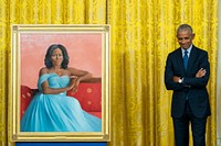 Former President Barack Obama stands by the portrait of former First Lady Michelle Obama the unveiling of their official White House portraits, Wednesday, September 7, 2022, in the East Room of the White House. (Official White House Photo by Cameron Smith)