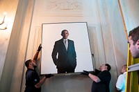 White House staff hang the newly-unveiled portrait of former President Barack Obama, Wednesday, September 7, 2022, in the Grand Foyer of the White House. (Official White House photo by Erin Scott)