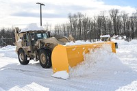 As foot after foot of snow fell – a total of 54 inches by the time the storm lifted – Fort Drum personnel worked tirelessly to manage the lake effect snowstorm that closed the post Nov. 18-21. Snow plows worked to keep access control points and main roads accessible, before concentrating on other critical roadways and buildings. Community members spent hours clearing residential driveways blanketed with heavy snow. (Photo by Mike Strasser, Fort Drum Garrison Public Affairs)