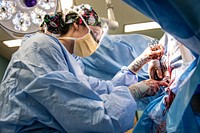 CP22 - Comfort Conducts Surgery Onboard in Santo Domingo221130-N-LP924-1098 SANTO DOMINGO, Dominican Republic (Nov. 30, 2022) Lt. Eleanor Wade, from Raleigh, North Carolina, conducts a hysterectomy on a Dominican Republic native aboard the hospital ship USNS Comfort (T-AH 20), Nov. 30, 2022. Comfort is deployed to U.S. 4th Fleet in support of Continuing Promise 2022, a humanitarian assistance and goodwill mission conducting direct medical care, expeditionary veterinary care, and subject matter expert exchanges with five partner nations in the Caribbean, Central and South America. (U.S. Navy photo by Mass Communication Specialist 3rd Class Sophia Simons)