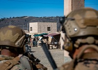 Operation Firebreak: Sharpening the Scalpel 221115-N-BC658-1282CAMP PENDLETON, Calif. (Nov. 15, 2022) – Marines of 2nd Battalion, 1st Marines prepare to take an objective during a simulated combat casualty egress exercise with high fidelity manikins at Naval Expeditionary Medical Institute (NEMTI) during Operation Firebreak, November 15.Operation Firebreak is an exercise designed to evaluate operational readiness through simulated point of injury treatment and transport of casualties to the next level of care. Navy Medicine Operational Training Command (NMOTC) is comprised of six nationwide detachments that offer specialized medical training in the fields of aviation, aviation survival, surface and undersea warfare, expeditionary and special operations medicine. (U.S. Navy Photo by Mass Communication Specialist 2nd Class Russell Lindsey)