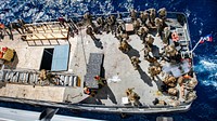 Comfort Arrives in Haiti JEREMIE, Haiti (Dec. 11, 2022) Sailors and Marines assigned to the hospital ship USNS Comfort (T-AH 20) await departure to setup the medical site in Jeremie, Haiti, Dec. 11, 2022. Comfort is deployed to U.S. 4th Fleet in support of Continuing Promise 2022, a humanitarian assistance and goodwill mission conducting direct medical care, expeditionary veterinary care, and subject matter expert exchanges with five partner nations in the Caribbean, Central and South America. (U.S. Navy photo by Mass Communication Specialist 3rd Class Sophia Simons)