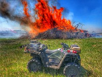 Equipment Category - USFWS 2022 Photo/Video ContestBurn piles are completed at Morris Wetland Management District in Minnesota. UTV's are often used to patrol the area to make sure spot fires don't occur. Photo by Phil Millette/USFWS