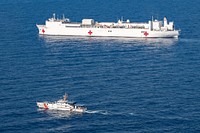 USNS Comfort sails off the coast of Jeremie, Haiti221214-N-DF135-1072 JEREMIE, Haiti (Dec. 14, 2022) The fast response cutter USCGC Kathleen Moore (WPC 1109) sails alongside the hospital ship USNS Comfort (T-AH 20) during Continuing Promise 2022, off the coast of Jeremie, Haiti, Dec. 14, 2022. Comfort is deployed to U.S. 4th Fleet in support of Continuing Promise 2022, a humanitarian assistance and goodwill mission conducting direct medical care, expeditionary veterinary care, and subject matter expert exchanges with five partner nations in the Caribbean, Central and South America. (U.S. Navy photo by Mass Communication Specialist 3rd Class Deven Fernandez)